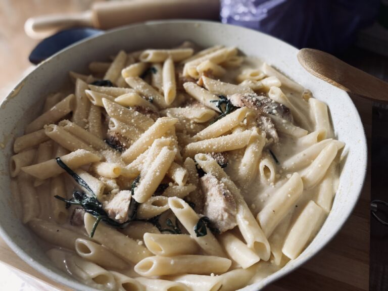 Creamy Chicken Penne Recipe: Ingredients include cooked penne pasta, chicken broth, butter, garlic, salt, pepper, all-purpose cream, and cooked chicken pieces, ready for a delicious creamy pasta dish.