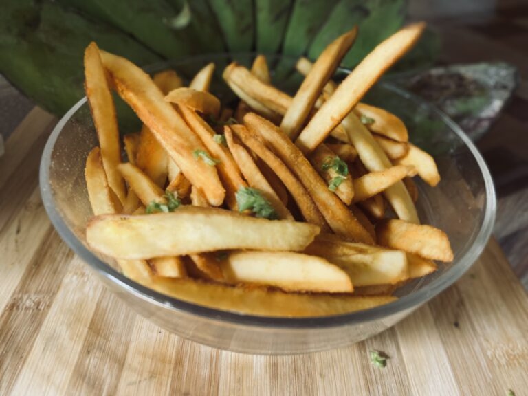 Banana fries in a bowl glass.